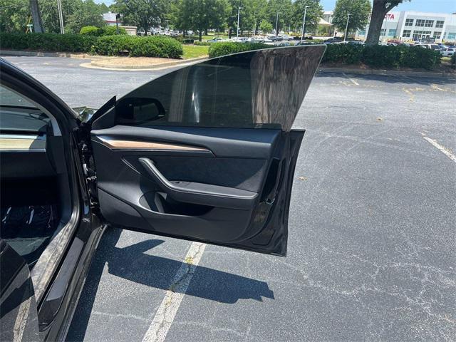 used 2023 Tesla Model 3 car, priced at $31,491