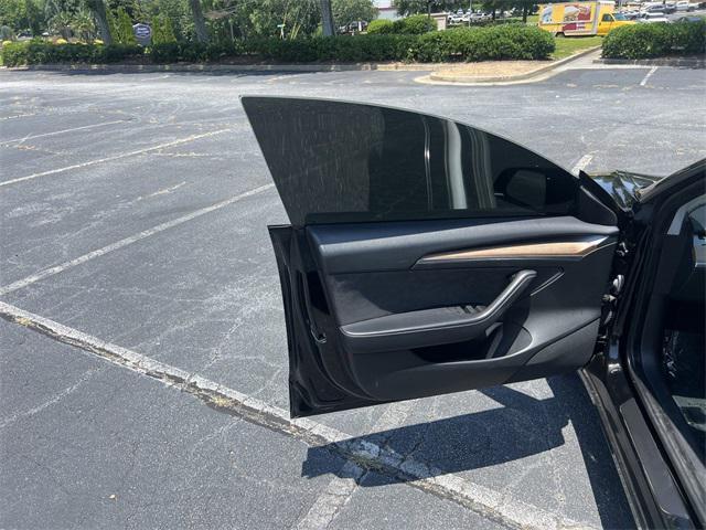 used 2023 Tesla Model 3 car, priced at $31,491