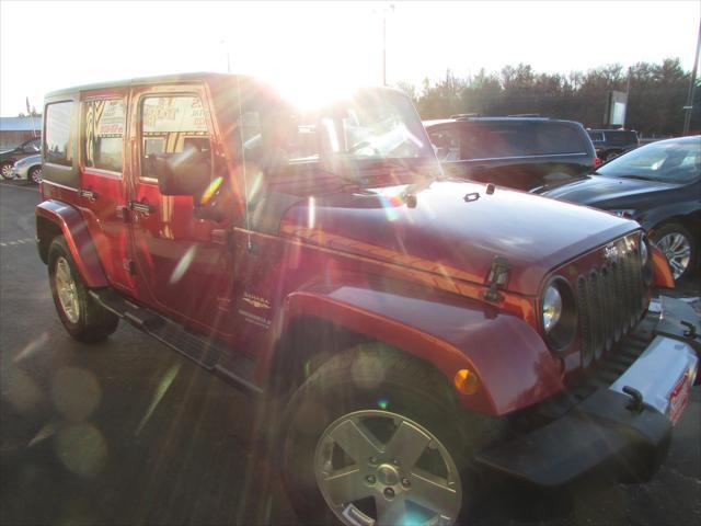used 2012 Jeep Wrangler Unlimited car, priced at $15,999