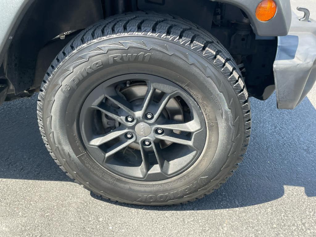 used 2014 Jeep Wrangler Unlimited car, priced at $13,910