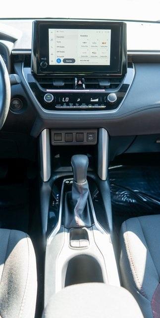 used 2024 Toyota Corolla Cross Hybrid car, priced at $29,999
