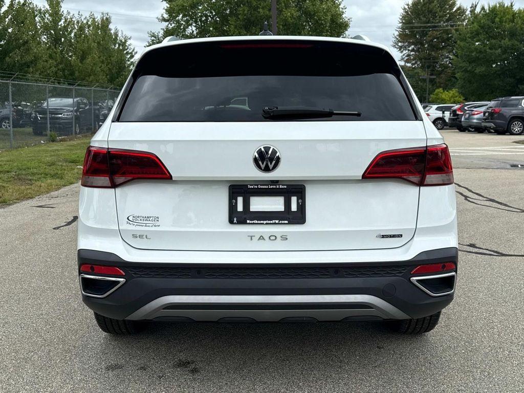 used 2022 Volkswagen Taos car, priced at $21,417