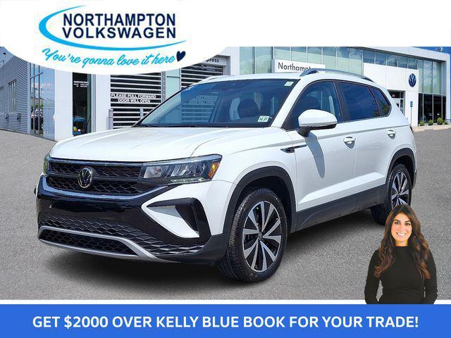 used 2022 Volkswagen Taos car, priced at $27,065