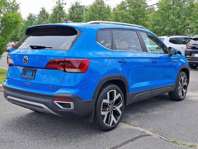used 2023 Volkswagen Taos car, priced at $27,161