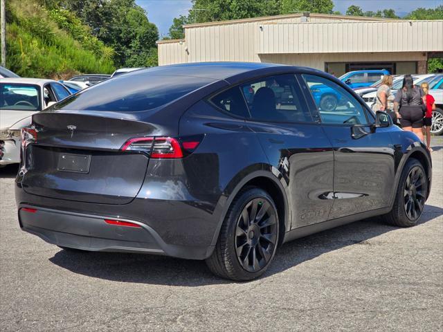 used 2024 Tesla Model Y car, priced at $31,984
