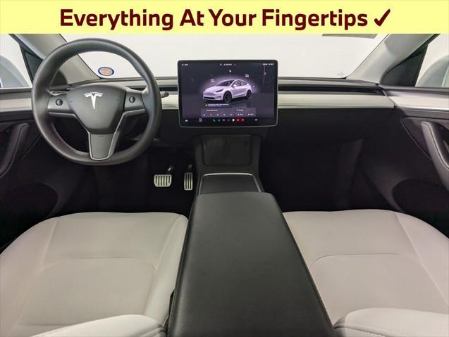 used 2023 Tesla Model Y car, priced at $31,141