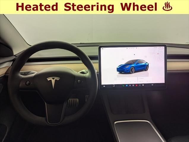 used 2023 Tesla Model 3 car, priced at $30,928