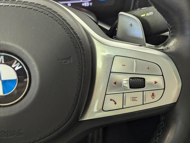 used 2022 BMW 740 car, priced at $47,748