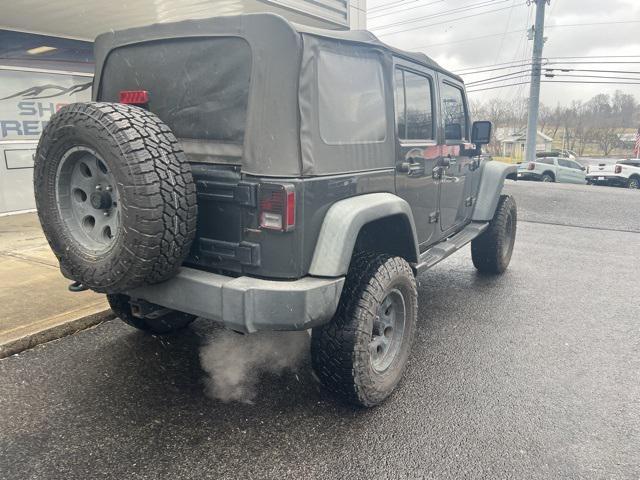 used 2010 Jeep Wrangler Unlimited car, priced at $14,244