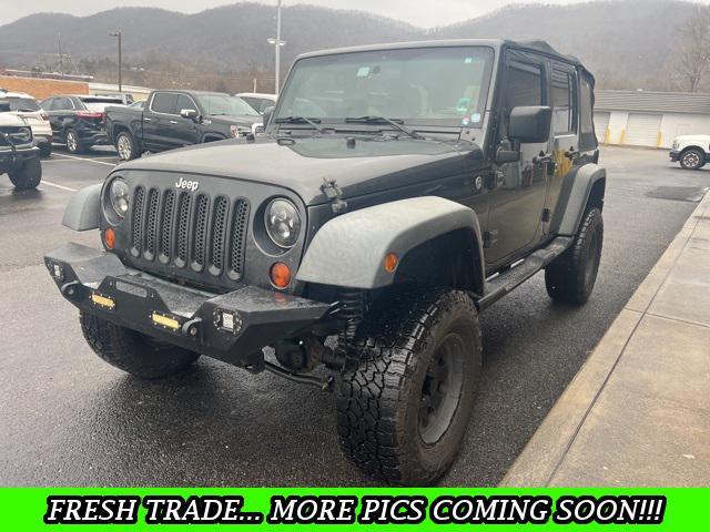 used 2010 Jeep Wrangler Unlimited car, priced at $14,244