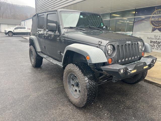 used 2010 Jeep Wrangler Unlimited car, priced at $14,244