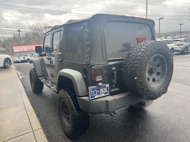 used 2010 Jeep Wrangler Unlimited car, priced at $14,244