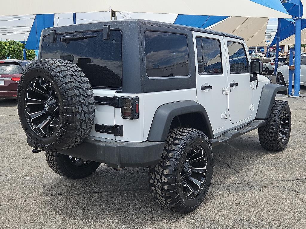 used 2018 Jeep Wrangler JK Unlimited car, priced at $22,991
