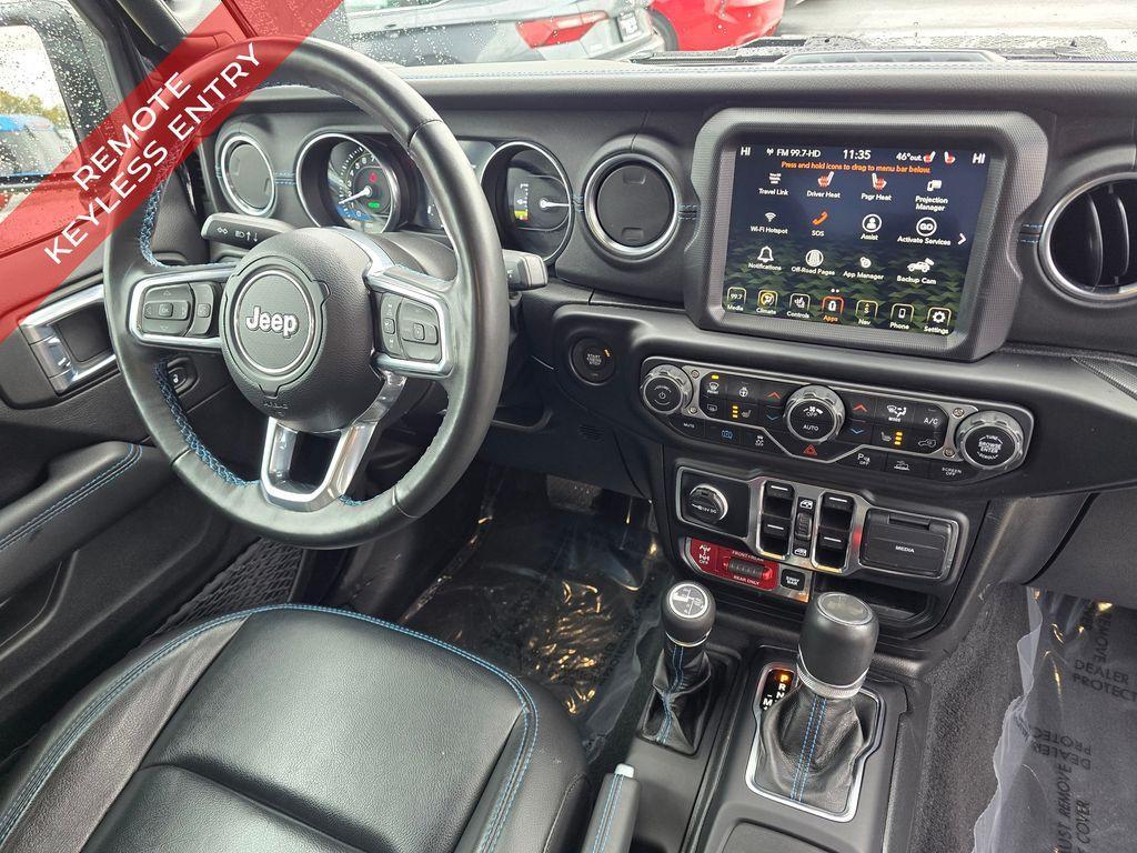 used 2023 Jeep Wrangler 4xe car, priced at $39,339