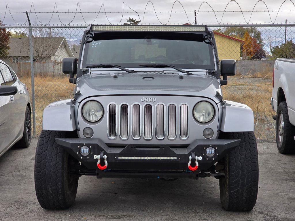 used 2014 Jeep Wrangler Unlimited car, priced at $23,744