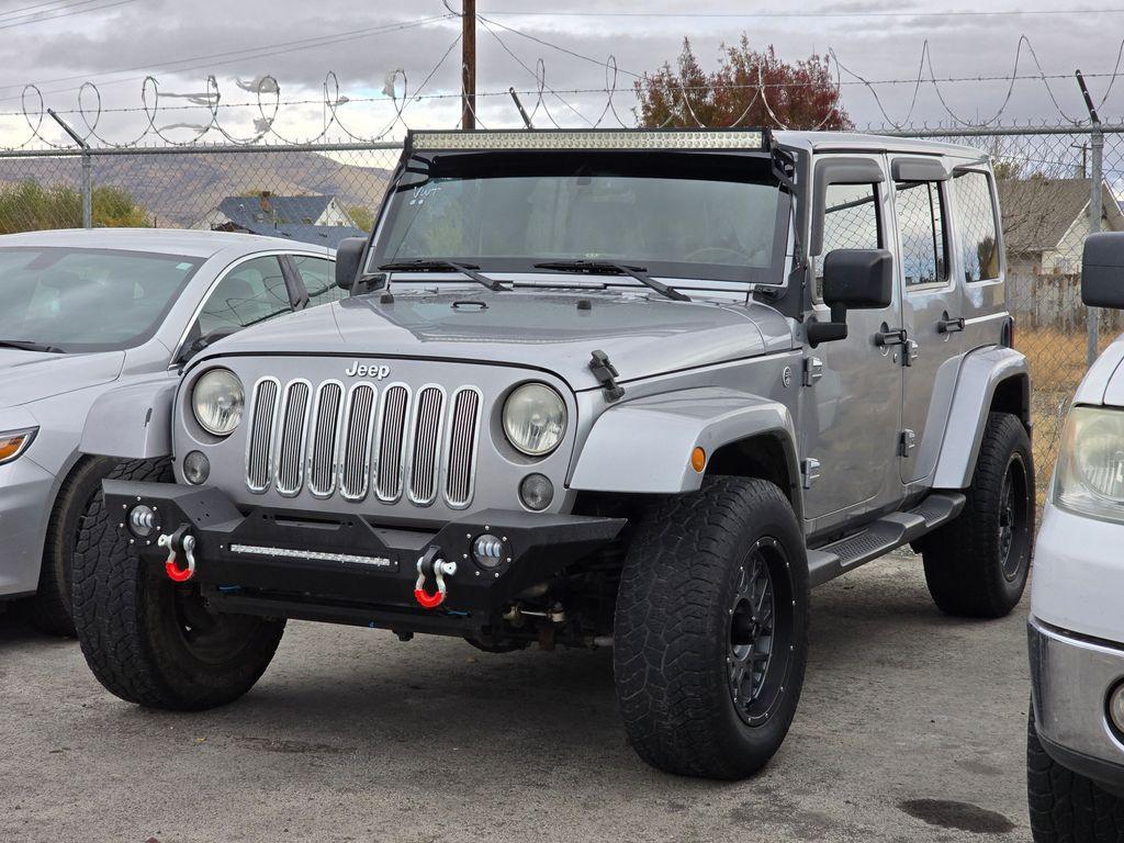 used 2014 Jeep Wrangler Unlimited car, priced at $23,744