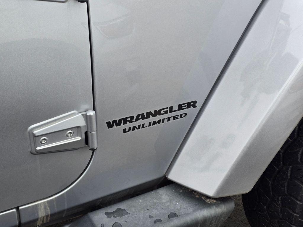used 2014 Jeep Wrangler Unlimited car, priced at $23,744