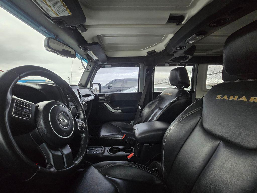 used 2014 Jeep Wrangler Unlimited car, priced at $23,744