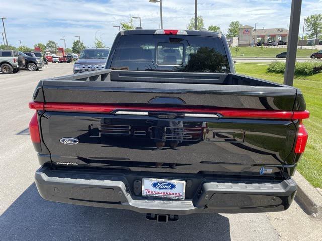 new 2023 Ford F-150 Lightning car, priced at $59,680