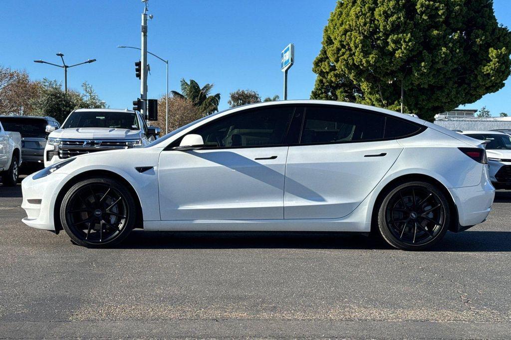 used 2021 Tesla Model 3 car, priced at $22,000