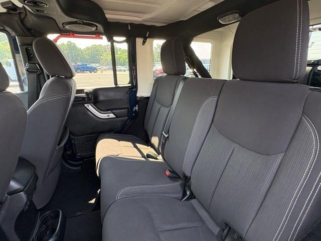 used 2013 Jeep Wrangler Unlimited car, priced at $17,978