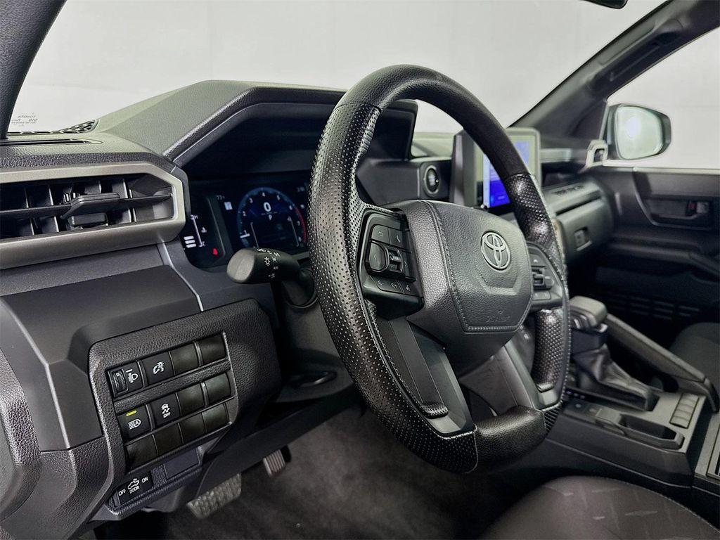 used 2024 Toyota Tacoma car, priced at $26,998