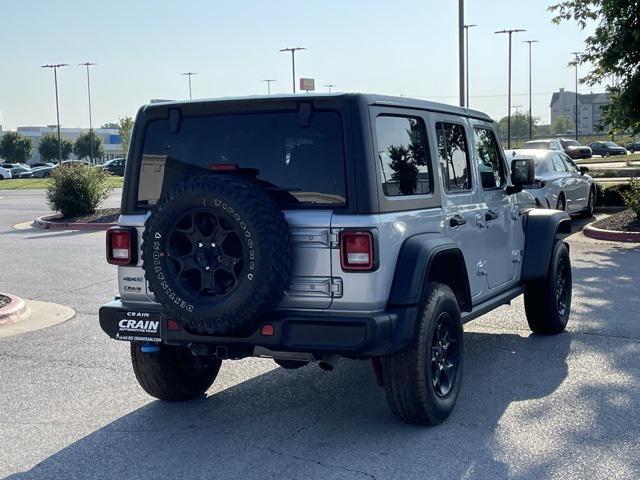 used 2023 Jeep Wrangler 4xe car, priced at $27,689