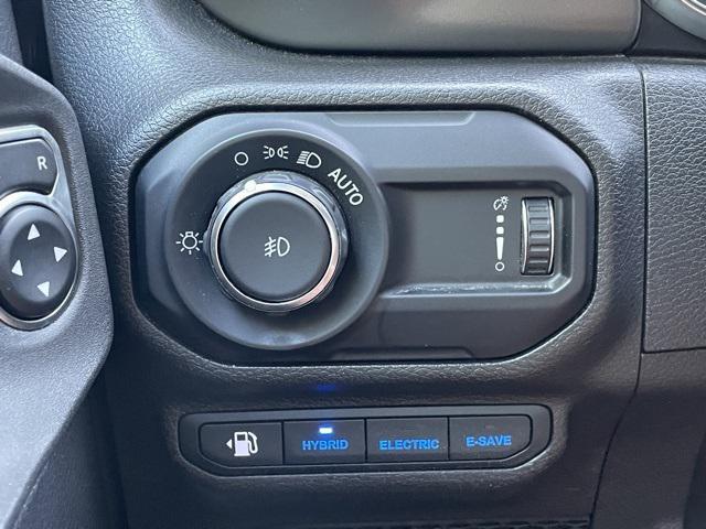 used 2023 Jeep Wrangler 4xe car, priced at $27,689