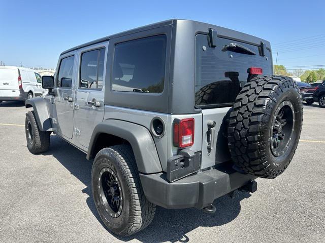 used 2014 Jeep Wrangler Unlimited car, priced at $16,977