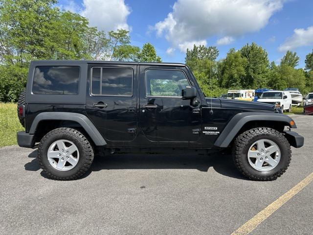 used 2015 Jeep Wrangler Unlimited car, priced at $18,557