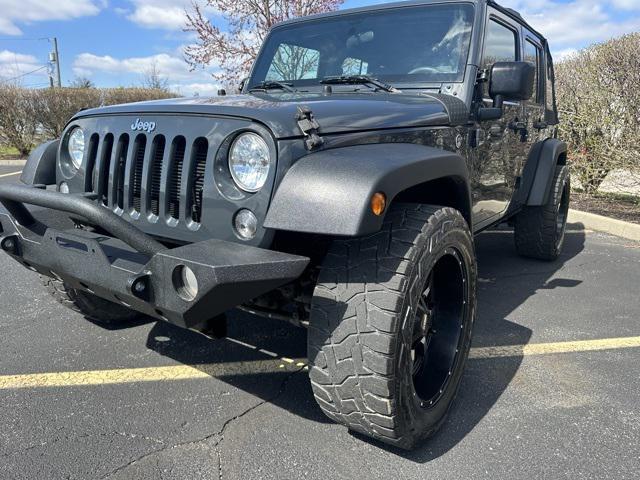 used 2016 Jeep Wrangler Unlimited car, priced at $16,876