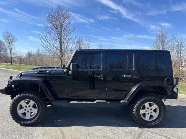 used 2010 Jeep Wrangler Unlimited car, priced at $13,477