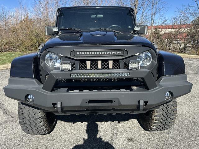 used 2010 Jeep Wrangler Unlimited car, priced at $13,477