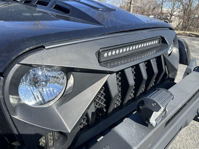 used 2010 Jeep Wrangler Unlimited car, priced at $13,477