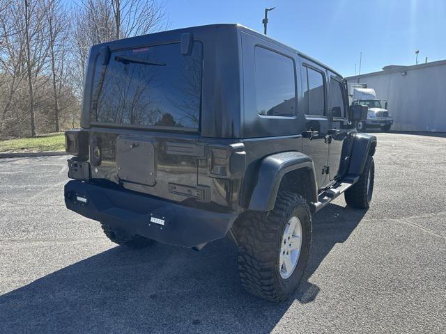 used 2010 Jeep Wrangler Unlimited car, priced at $13,477