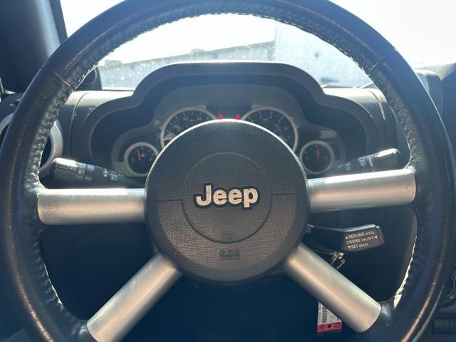used 2010 Jeep Wrangler Unlimited car, priced at $13,477