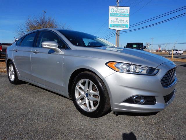 used 2016 Ford Fusion car, priced at $11,999