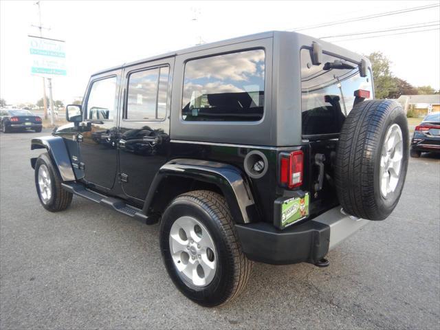 used 2015 Jeep Wrangler Unlimited car, priced at $20,999