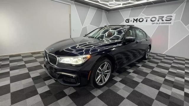 used 2016 BMW 750 car, priced at $26,300