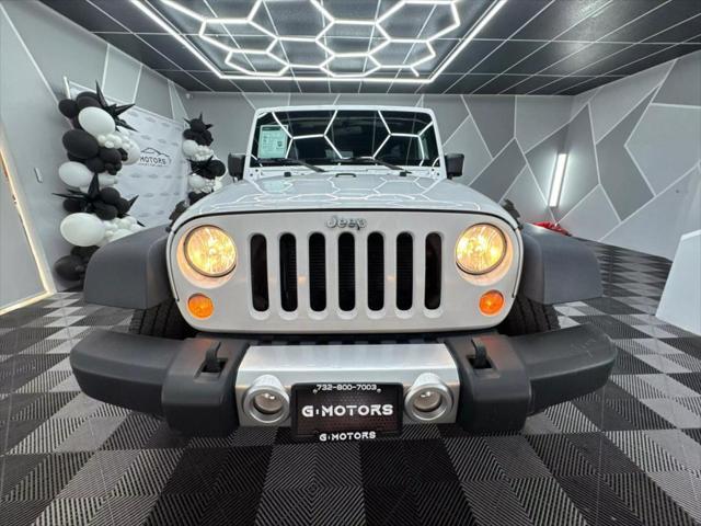 used 2016 Jeep Wrangler Unlimited car, priced at $18,600