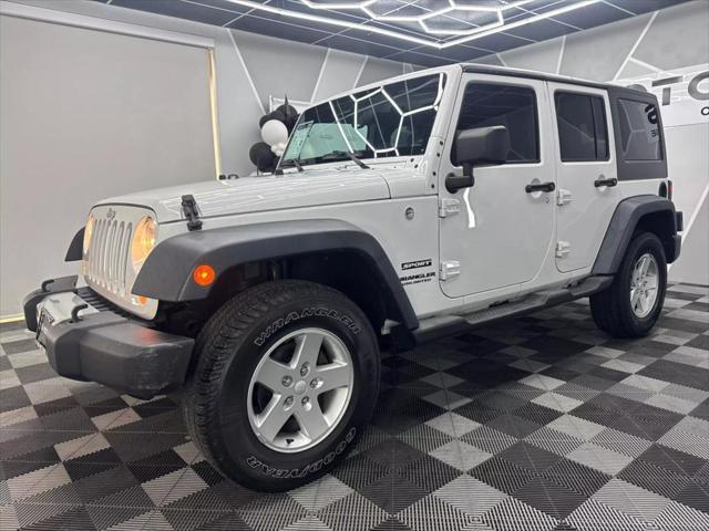 used 2016 Jeep Wrangler Unlimited car, priced at $18,600