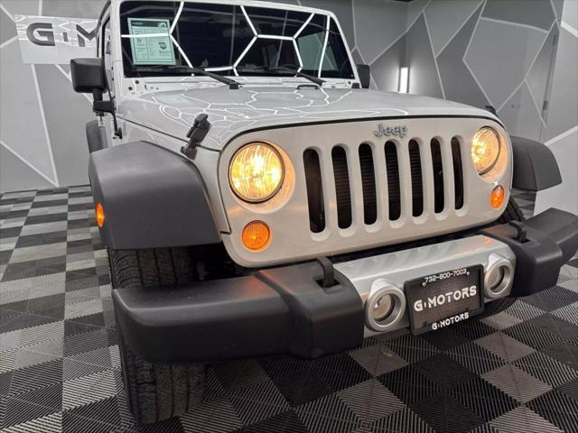 used 2016 Jeep Wrangler Unlimited car, priced at $18,600