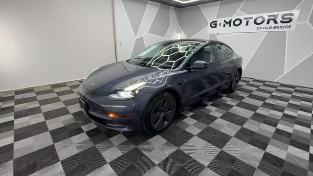 used 2022 Tesla Model 3 car, priced at $25,500