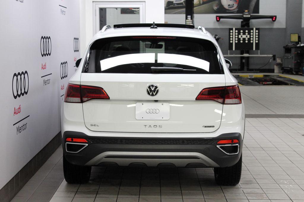 used 2023 Volkswagen Taos car, priced at $30,000