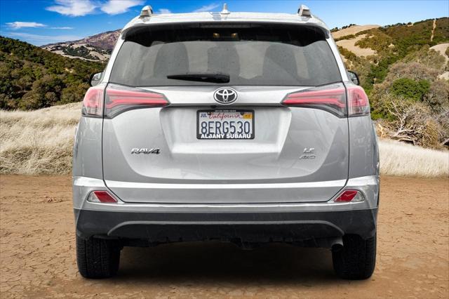 used 2018 Toyota RAV4 car, priced at $23,888