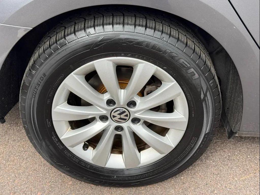 used 2014 Volkswagen Passat car, priced at $7,999