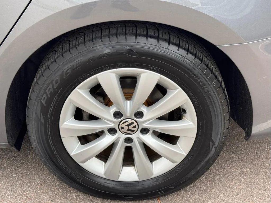 used 2014 Volkswagen Passat car, priced at $7,999