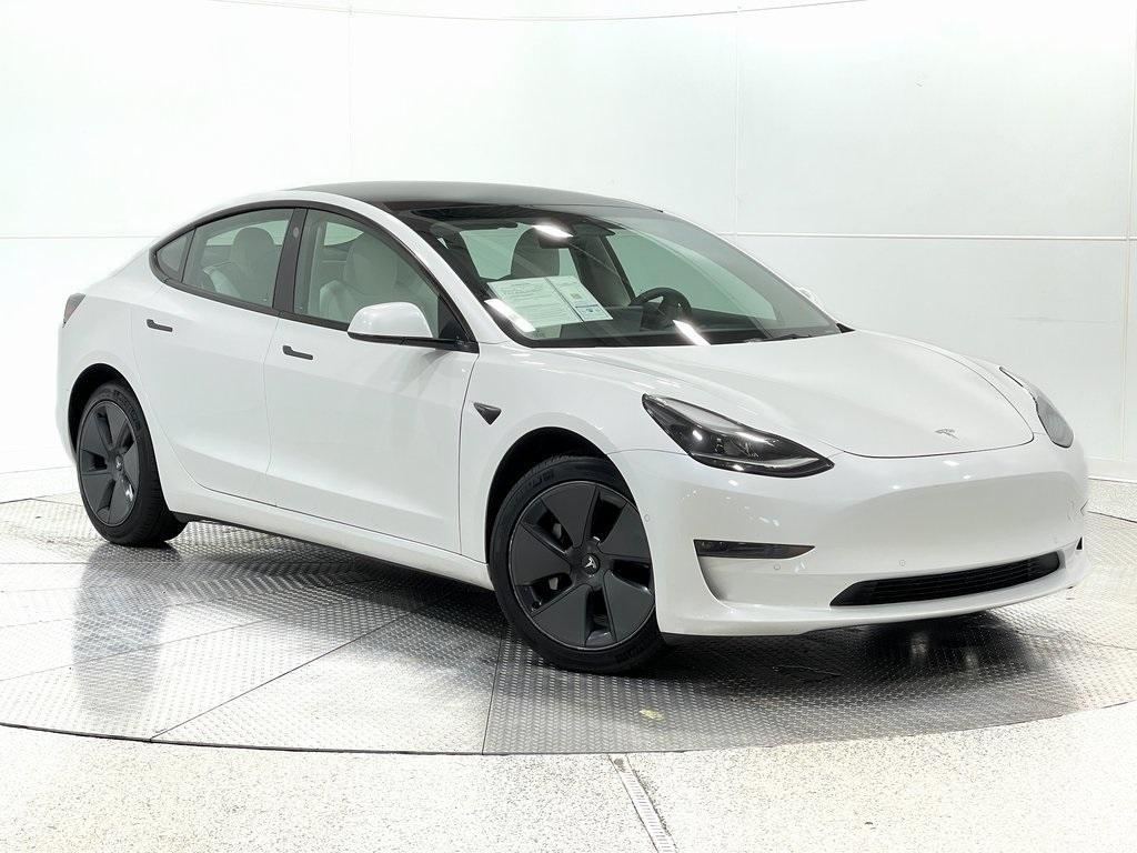 used 2022 Tesla Model 3 car, priced at $28,070