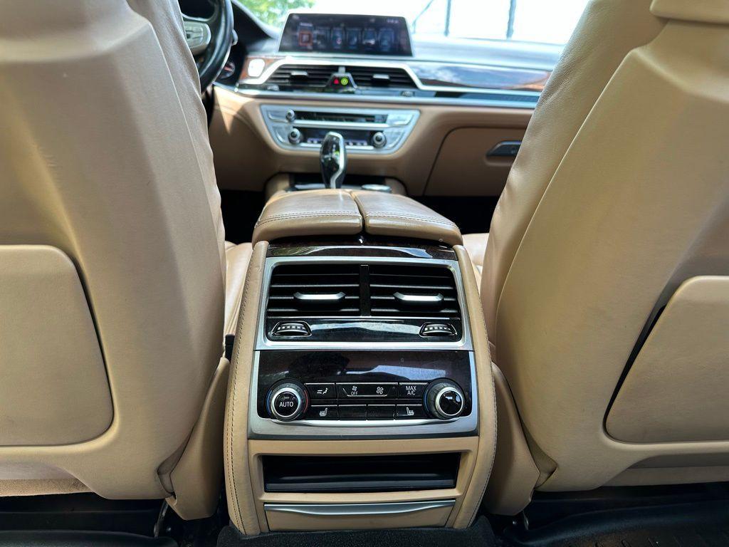 used 2016 BMW 750 car, priced at $18,500