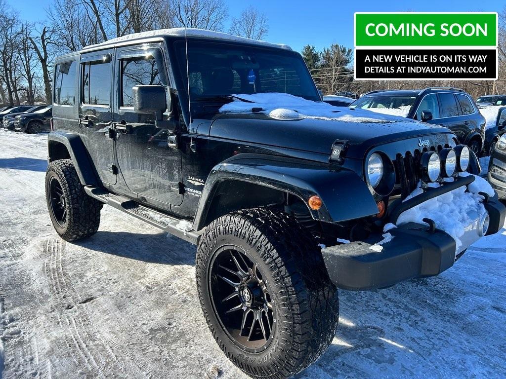 used 2012 Jeep Wrangler Unlimited car, priced at $16,397